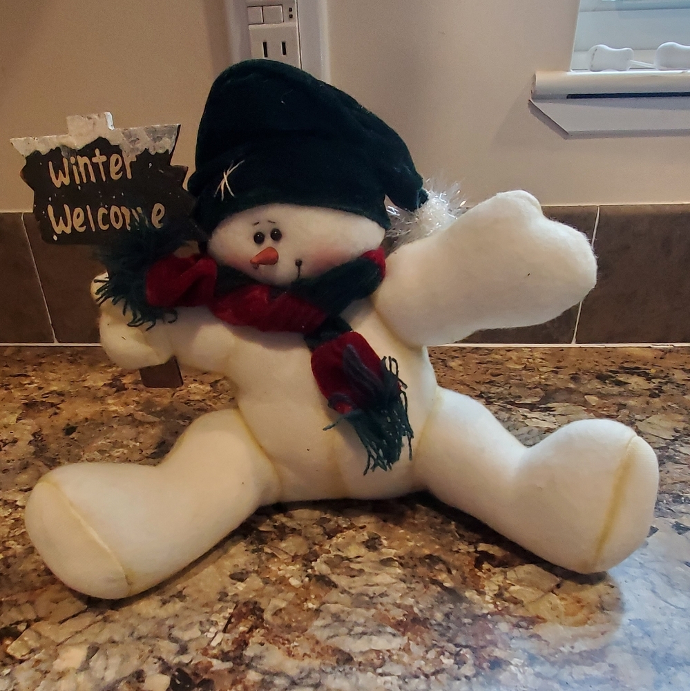 Festive Snowman Plush with Scarf, Hat, And Dign